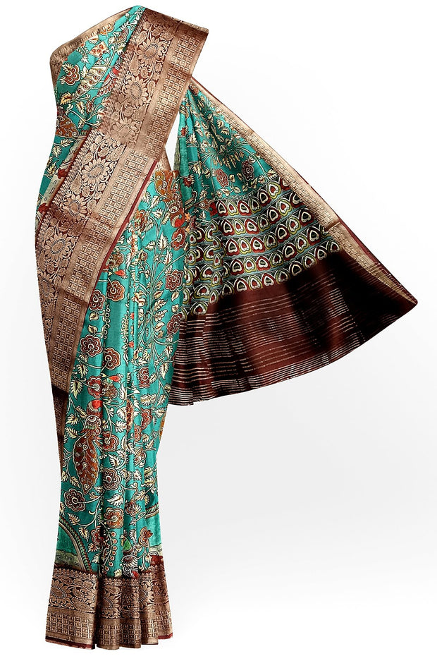 Dola silk saree with floral vines & peacocks in green