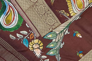 Dola silk saree with floral vines , peacocks and paisley motifs in brown