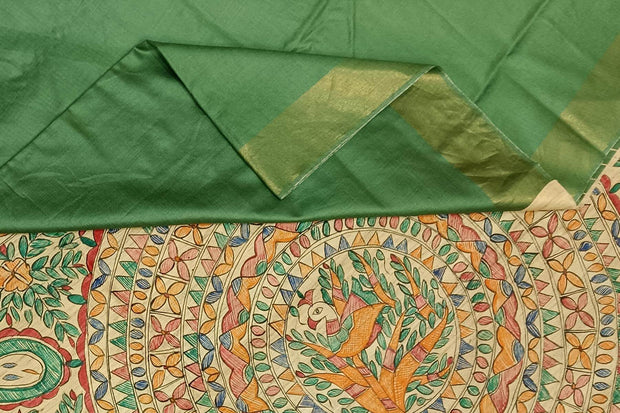 Handwoven Eri silk saree in moss green with hand painted Madhubani art