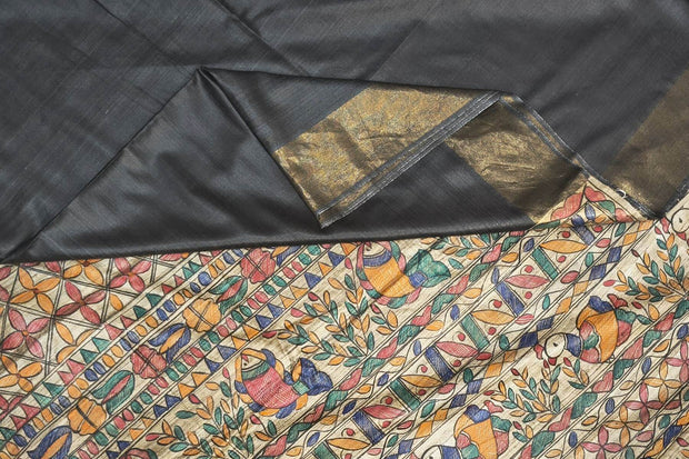 Handwoven Eri silk saree in black with hand painted Madhubani art on pallu.