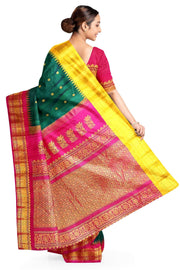 Handwoven Gadwal pure silk saree in bottle green  with small motifs