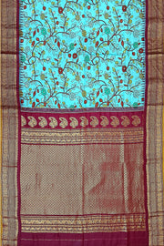 Handwoven Gadwal pure silk printed saree in  pool blue with floral vines .