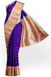 Handwoven Gadwal pure silk saree in purple with floral and paisley  motifs in gold & silver.