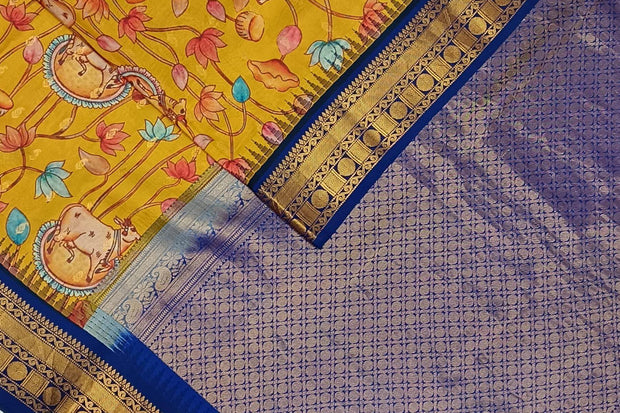 Gadwal pure silk printed pichwai design mustard saree with lotus vines & cows.