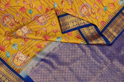 Gadwal pure silk printed pichwai design mustard saree with lotus vines & cows.