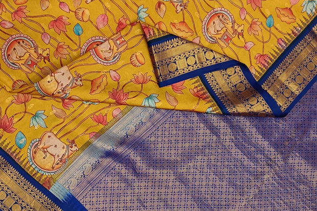 Gadwal pure silk printed pichwai design mustard saree with lotus vines & cows.