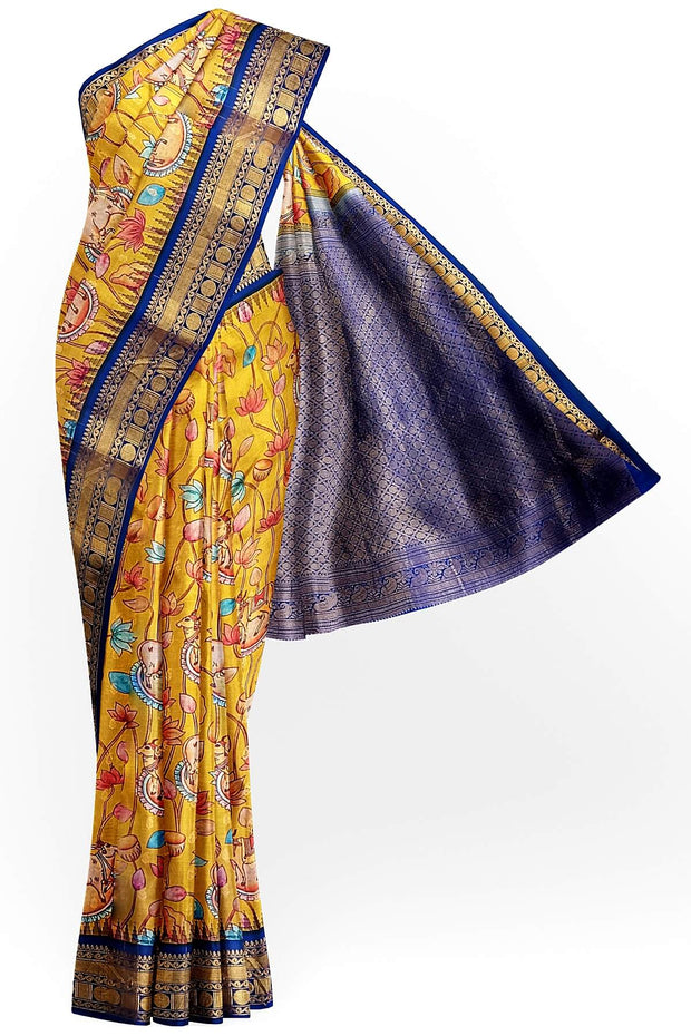 Gadwal pure silk printed pichwai design mustard saree with lotus vines & cows.