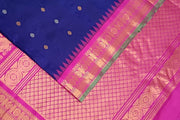 Handwoven Gadwal pure silk saree in royal blue with gold & silver buttis