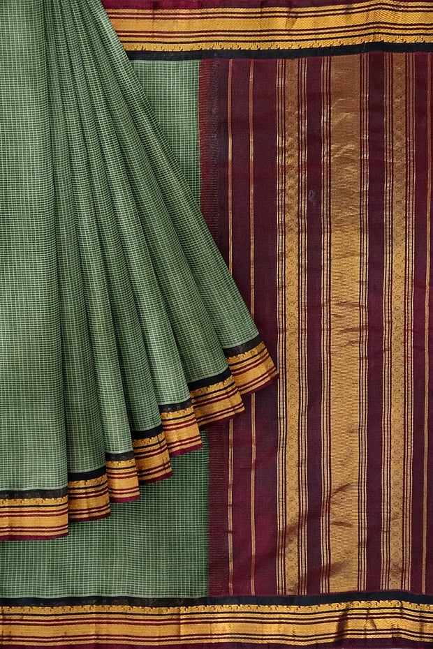 Handloom Gadwal pure cotton saree in fine checks in moss green  with silk pallu