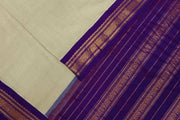 Handloom Gadwal pure cotton saree in fine checks in beige with silk pallu