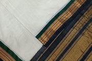 Handloom Gadwal pure cotton saree in fine checks in white with silk pallu