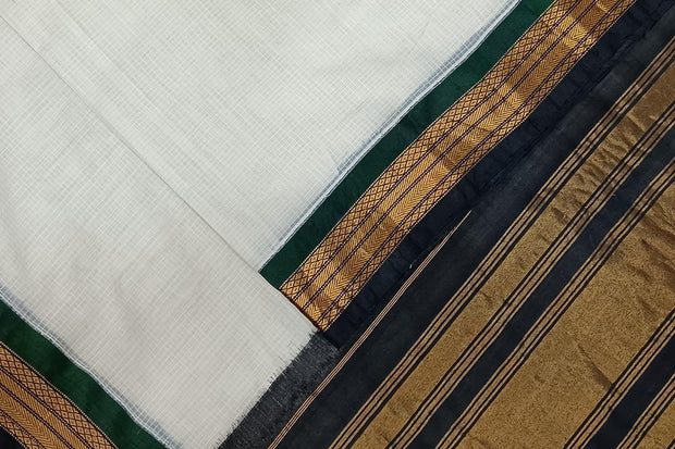 Handloom Gadwal pure cotton saree in fine checks in white with silk pallu