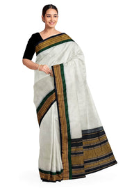 Handloom Gadwal pure cotton saree in fine checks in white with silk pallu