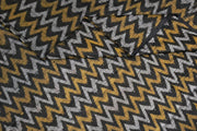 Handwoven Ikat pure silk fabric in black in zig zag pattern in dupion finish