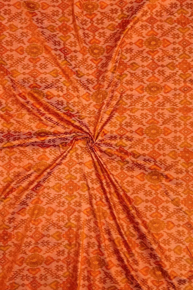 Handwoven Ikat pure silk fabric in orange in dupion finish