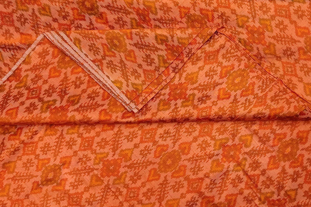 Handwoven Ikat pure silk fabric in orange in dupion finish