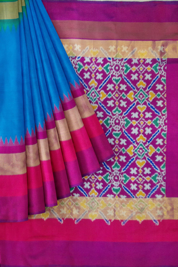 Ikat pure silk  saree in blue with Ganga Jamuna  temple zari border .