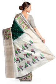 Handwoven ikat pure silk saree in dark green with small motifs