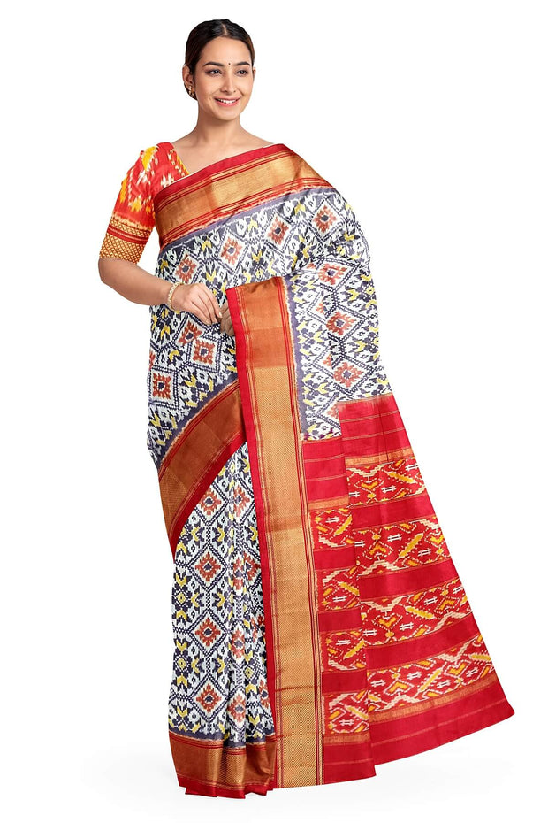 Handwoven ikat pure silk saree in off white in diamond design