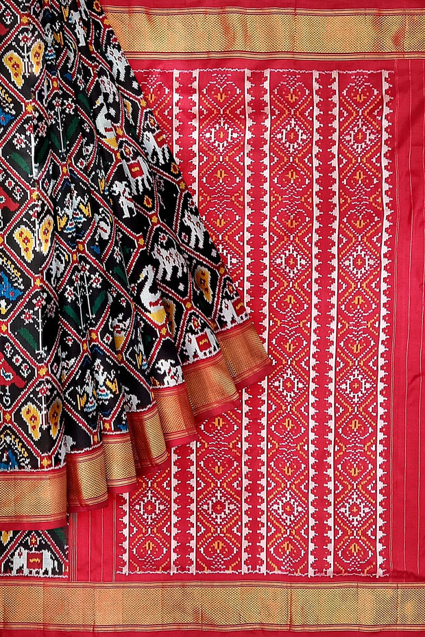 Handwoven Ikat pure silk saree in black in diamond pattern