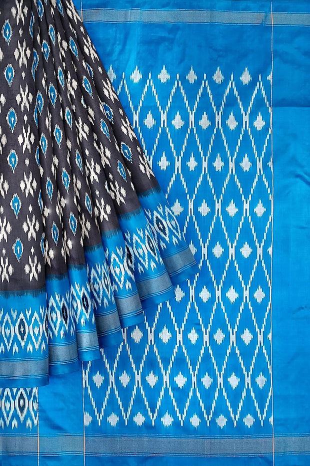 Handwoven ikat pure silk saree in grey with absract pattern on the body
