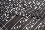 Handwoven ikat pure silk saree in black in telia pattern