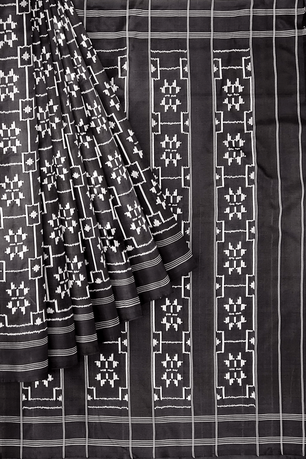 Handwoven ikat pure silk saree in black in telia pattern