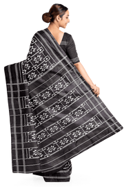 Handwoven ikat pure silk saree in black in telia pattern