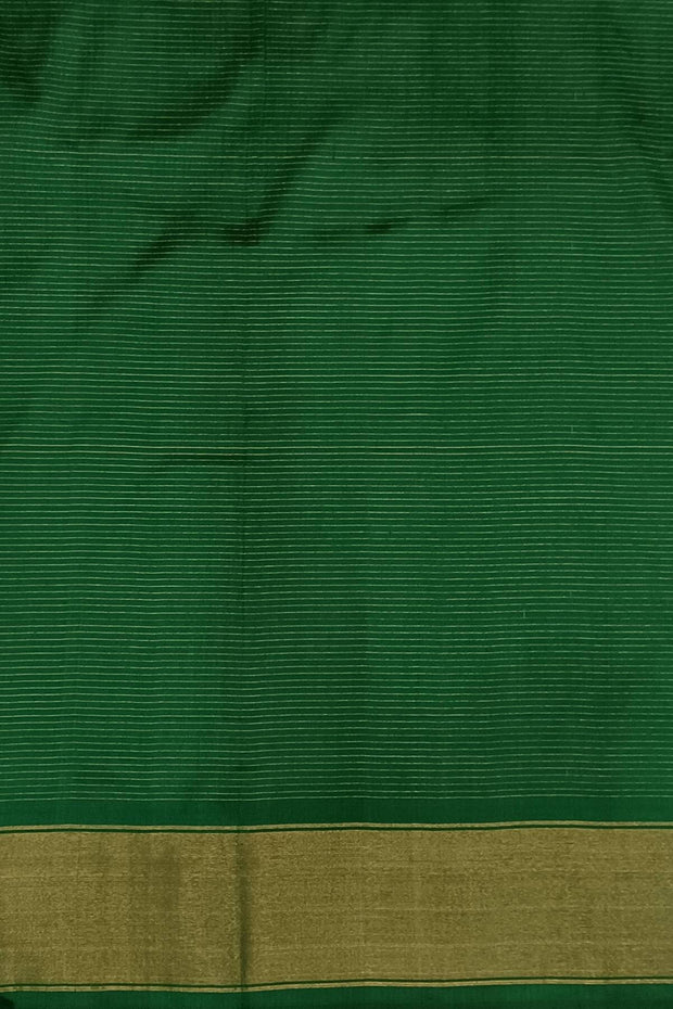 Handwoven ikat pure silk saree in bottle green in navratan pattern