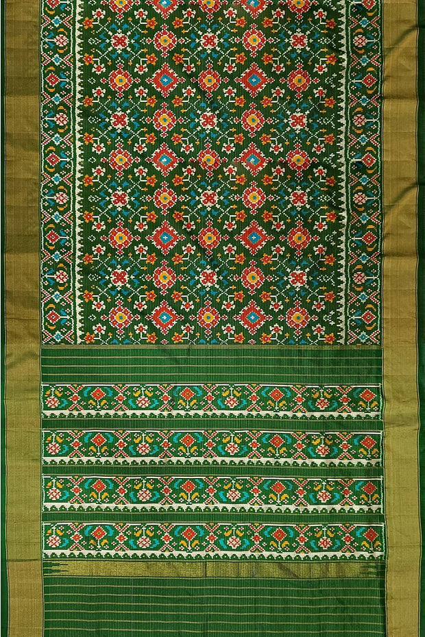 Handwoven ikat pure silk saree in bottle green in navratan pattern