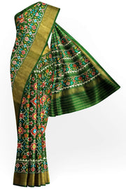 Handwoven ikat pure silk saree in bottle green in navratan pattern