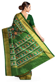 Handwoven ikat pure silk saree in bottle green in navratan pattern