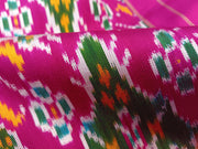 A handwoven twill weave ikat pure silk saree in pink with floral pattern  in circle