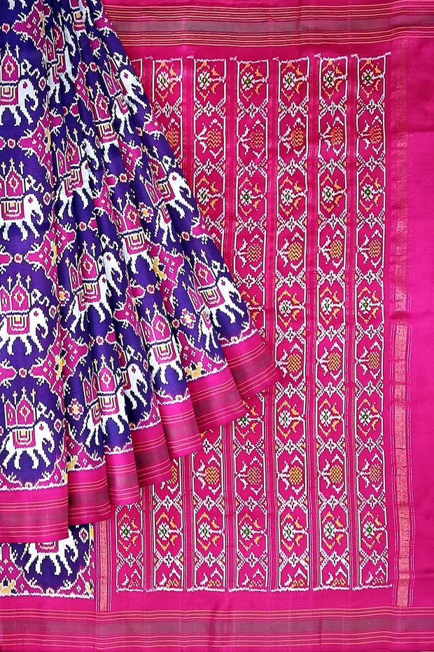 A handwoven  twill weave ikat pure silk saree in violet  with  kunj in chabdi