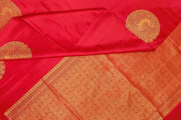 Kanchi soft silk saree in red with peacock motifs in gold