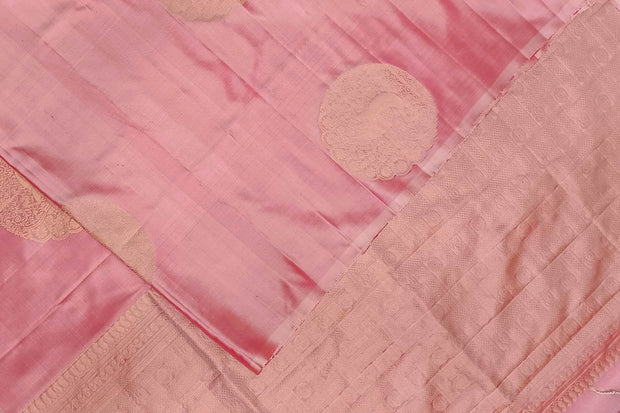 Kanchi soft silk saree in pink with peacock motifs in gold