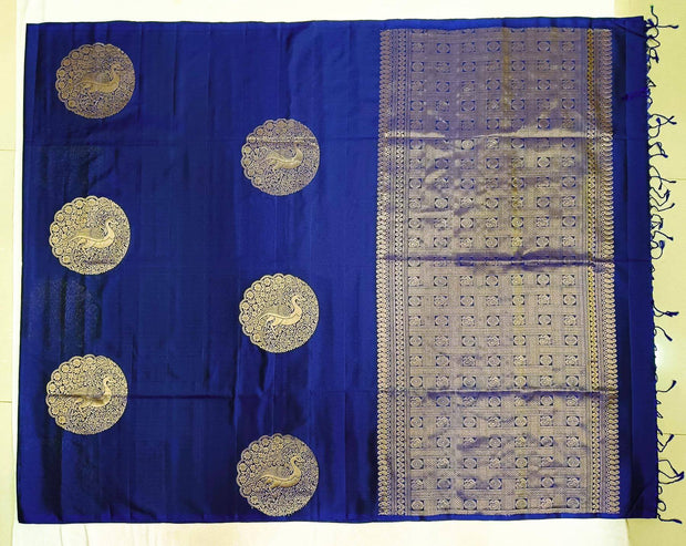 Kanchi soft silk saree in royal blue with peacock motifs in gold