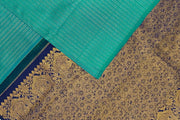 Kanchi borderless pure silk saree in teal green