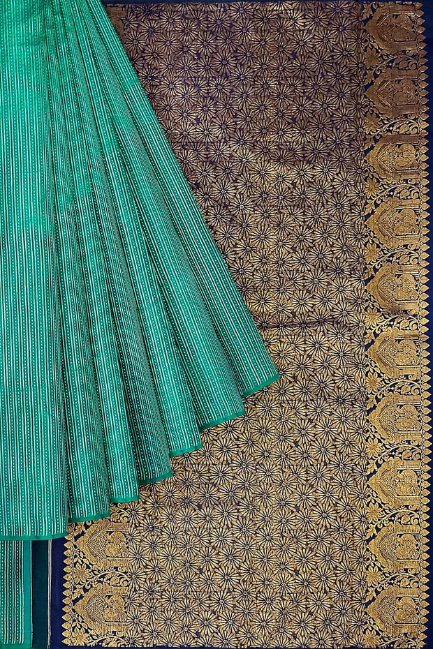 Kanchi borderless pure silk saree in teal green