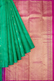 Kanchi borderless pure silk saree in teal green in checks