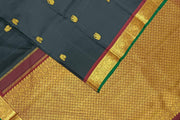 Kanchi pure silk saree in black with peacock & elephant motifs