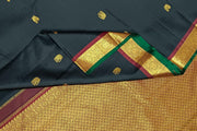 Kanchi pure silk saree in black with peacock & elephant motifs