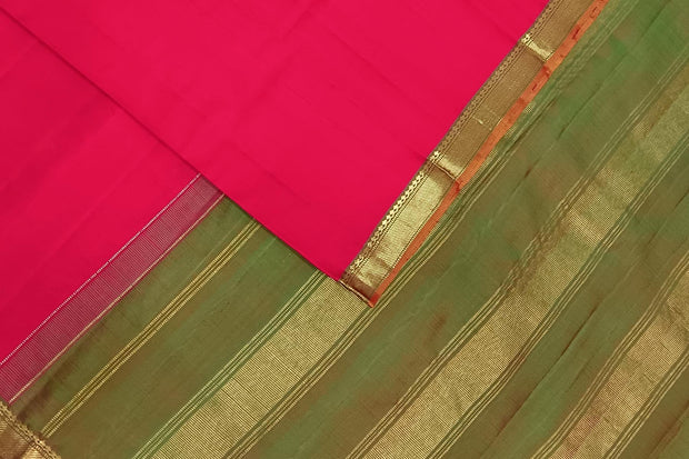 Kanchi  pure silk saree in pink with a striped contrast pallu