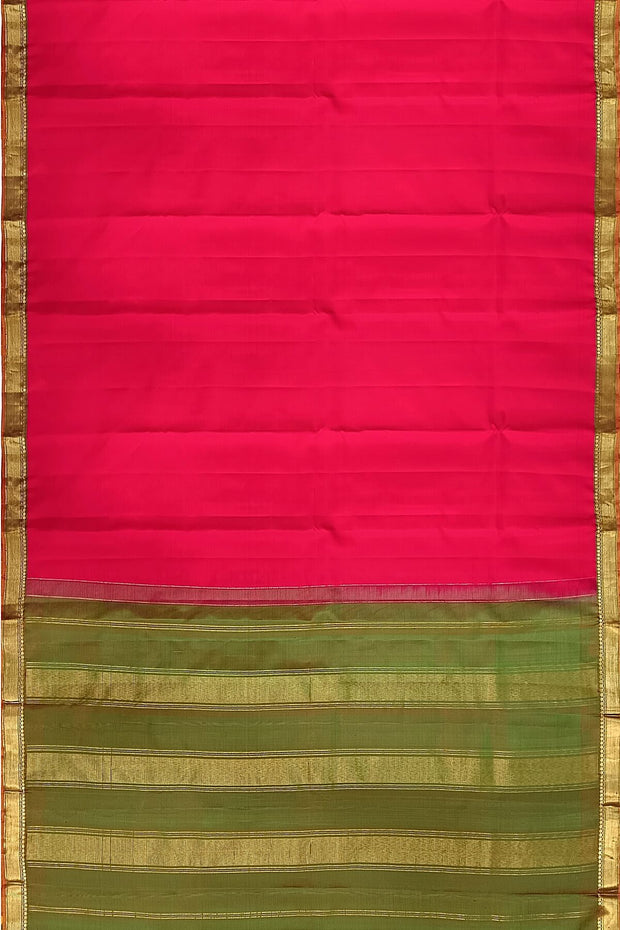 Kanchi  pure silk saree in pink with a striped contrast pallu