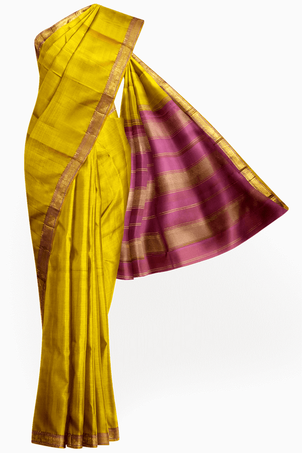 Kanchi pure silk saree in lemon green with a striped contrast pallu