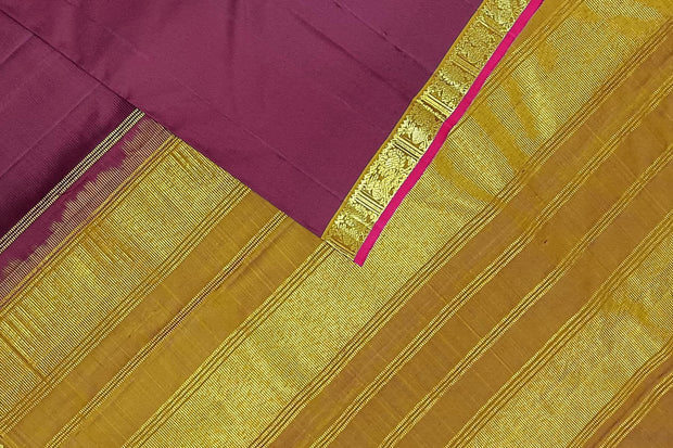 Kanchi pure silk saree in brown with a striped contrast pallu