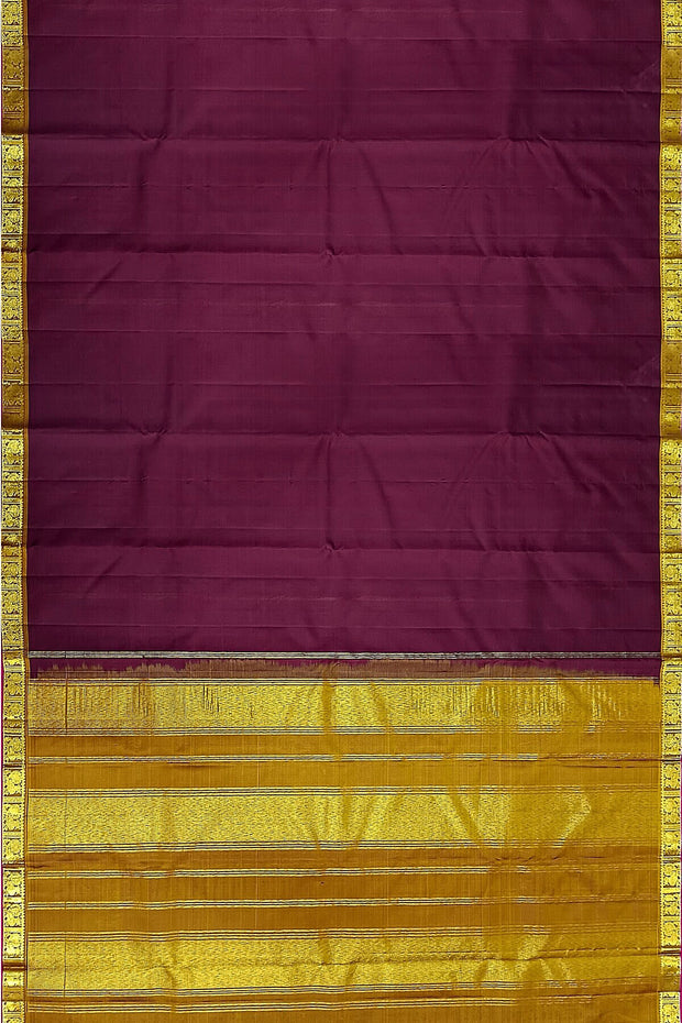 Kanchi pure silk saree in brown with a striped contrast pallu