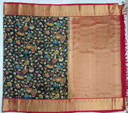 Kanchi pure silk  printed  kalamkari  dark green saree with floral & birds motifs .