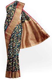 Kanchi pure silk  printed  kalamkari  dark green saree with floral & birds motifs .