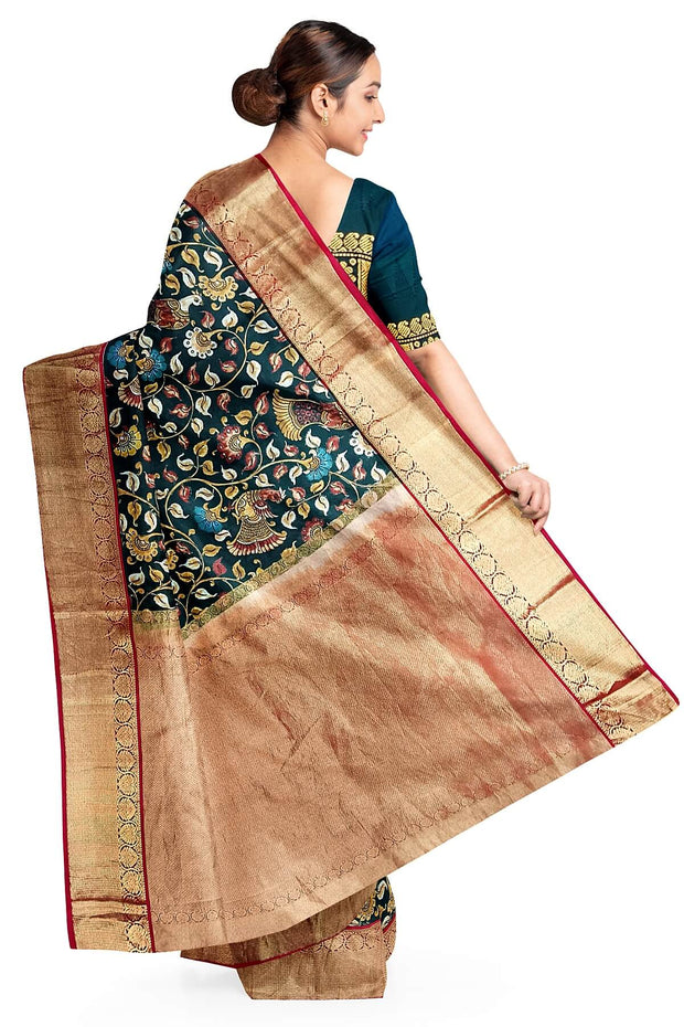 Kanchi pure silk  printed  kalamkari  dark green saree with floral & birds motifs .